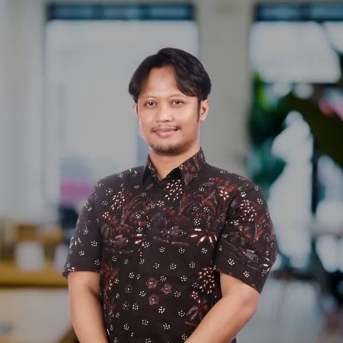 Ilham Ainuddin, S.AB., M.Si.